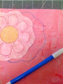 stabilizer. 2. Embroider your flower design created in Creative DRAWings. 3.