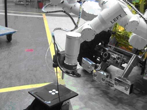 Robotic Arm Control - Vision Testbed Test Platform: The Eurobot test-bed robotic arm was used for vision based tests Test Setup A simulated sample-container is created by using visual targets in view