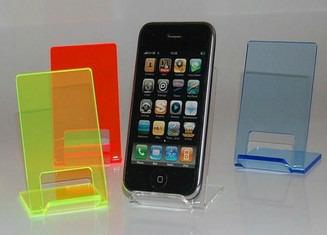 Q. The photograph above shows plastic iphone holders, designed by a pupil. (a) Give an example and explain the difference between Thermoset Plastics and Thermoplastics.