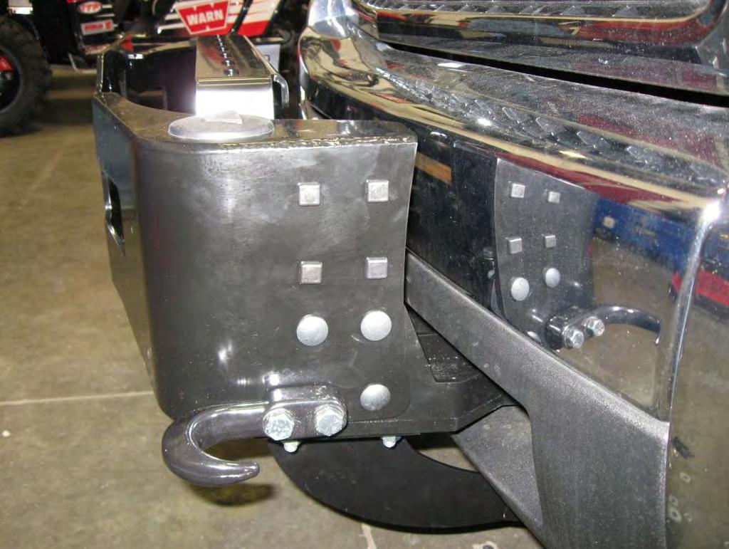 Attach tow hooks to these holes using ½ x 2 ¼ Hex Bolts 7/16 x 1 ¼ carriage bolts Figure 10 LH Side Member installed Install the Warn tow hooks to the outside of the winch carrier.