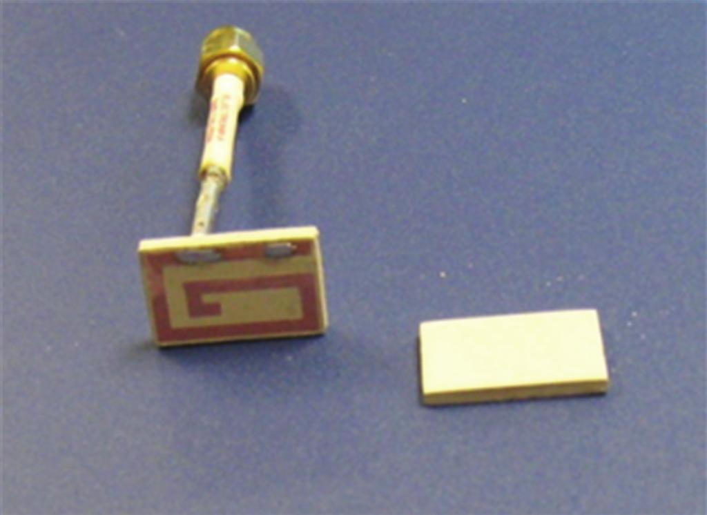 Figure 6: Fabricated embedded spiral-shaped microstrip implantable antenna: individual pieces, final prototype. Table 2: Calculated eﬃciency. Superstrate Eﬀ.