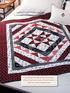 This striking throw features the popular black, white, and red color scheme. The quilt center is made from simple triangle-squares.