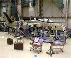 proceed Begin test aircraft modifications