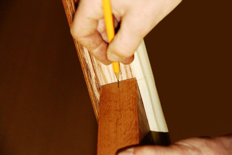 Remove the existing Wood Balusters from the railing by cutting them in half. Remove any old nails or wood plugs. (A Hand Saw or Power Saw can be used. Clean & sand as needed.