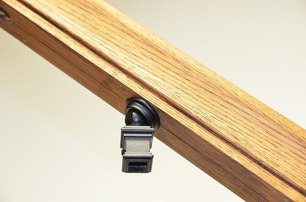 together as a unit, install the unit into the old baluster hole on the underside of the handrail.