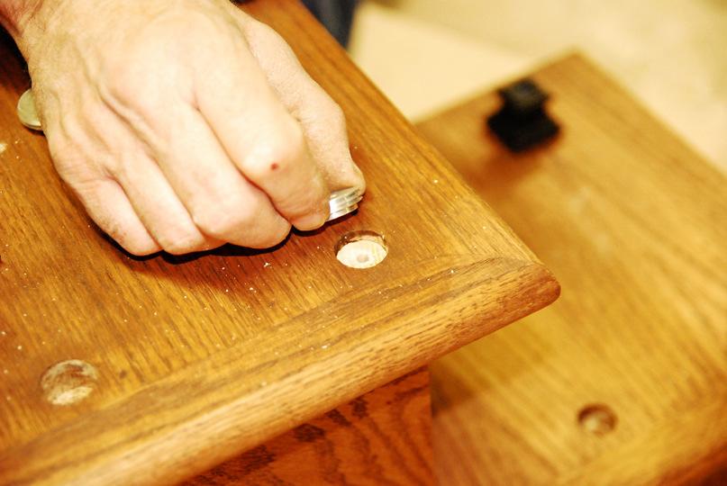 it to length, coat with adhesive, and insert into the hole. Photo #11 Place the proper centering plug into the hole.