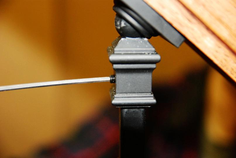 Step 9) Lift the Iron Baluster to fully insert the pin top into the Ball Adaptor and tighten the set screw to firmly secure the Iron Baluster into place.