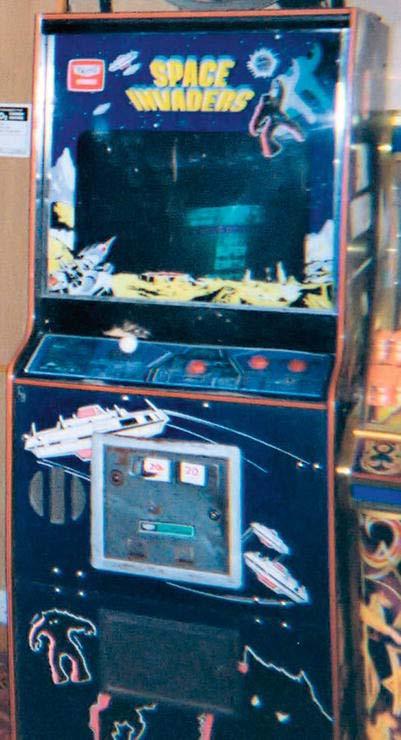 126 CHAPTER 5: Making a Shoot-Em Up: Carrot Invader Figure 5-1. A Space Invaders arcade cabinet. Space Invaders is a shoot em up game. You control a spaceship that shoots at its enemies with a cannon.