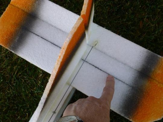 Pin the tail pieces (rudder, elevator) on a piece of cardboard, with a 1/32 (1mm) space between the pieces
