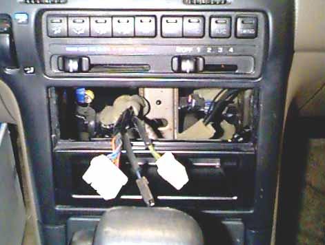 For more information on how to remove the radio, see the diagram below. STEP 2: Pull the radio from the dash. Unplug the antenna cable from the rear of the radio.