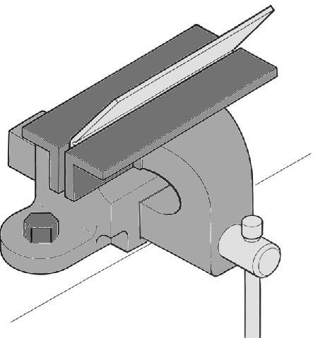 When folding long brass sections such as the side flanges of the cab floor, it is better to hold the flanges between two pieces of angle iron in a vice or clamps, as illustrated below.