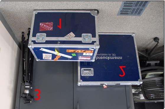 Figure 2: (1) Case containing scanner, optolink, and all necessary cables, (2) Case containing large calibration chart, (3) System tripod At minimum the scanner case and tripod are necessary for