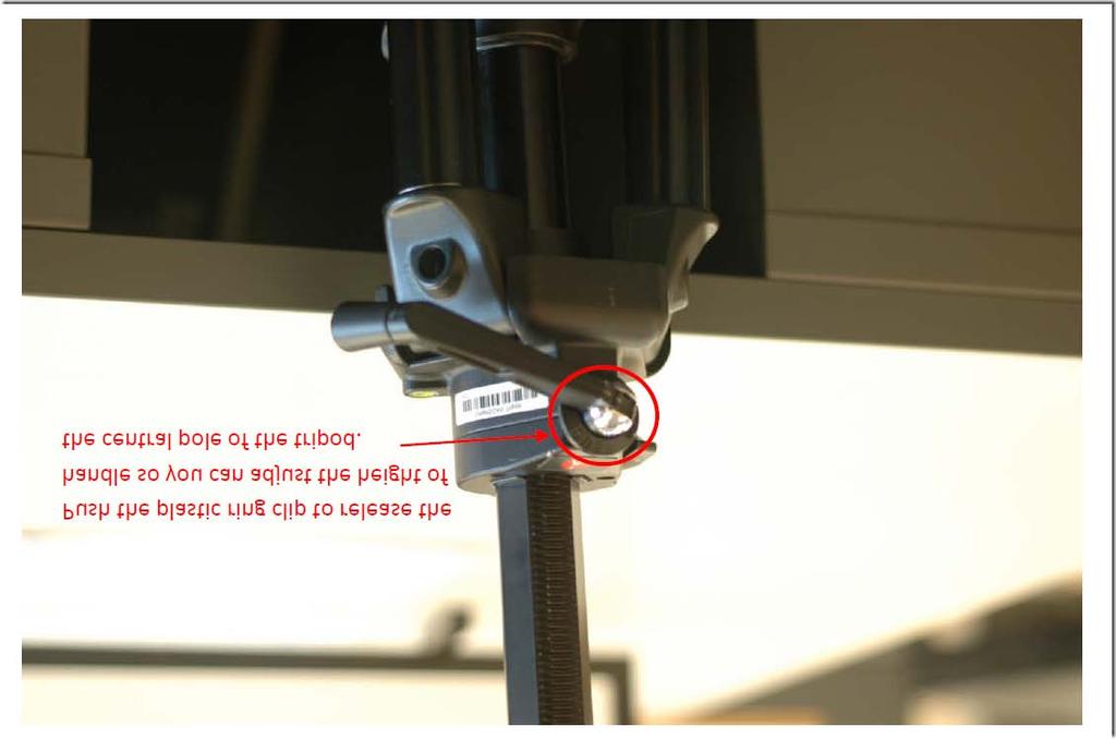 Fig.5: The central pole height is adjusted by turning this handle. LEVELING TRIPOD 6. Next, you want to adjust the tripod so that the second lowest level bubble is also within its level circle.