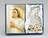 with a gold stamped, padded cover and gold edges, rosary with case,