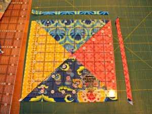 From the background fabric, cut 6 strips WOF at 8 1/2" wide and 2 strips WOF 13" wide and 1 strip 7" wide.