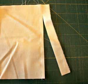 From the border fabric, cut 8 strips wof 6 1/2" wide. Sew them together in pairs and trim the selvedge off of the seam. (I sew mine 1" from the selvedge edge and trim down to 1/4").