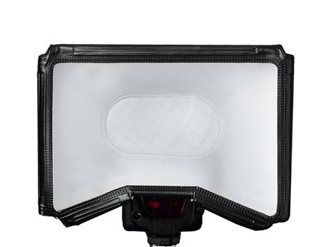 Securely affix flash softbox to flash head with the VELLO logo facing upward.