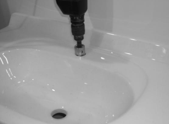 Drilling Tap Holes in the vanity top (if required) 1. To cut the holes use a high-speed steel hole saw of an appropriate size in an electric drill operating at a moderate speed.