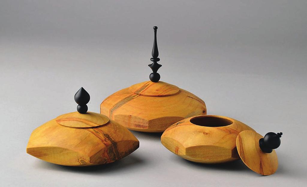 TURNING A FIVE-SIDED BOX Design brings regular polygons to life Ted Rasmussen Polygonal lidded boxes by Ted Rasmussen with five, seven, and nine sides; ambrosia maple with African blackwood finials.