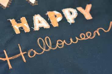Print out the Happy Halloween template. Trace the front side (it will appear backwards) of the letters using a transfer pencil. Use a hot iron to transfer the design onto your pillow top.
