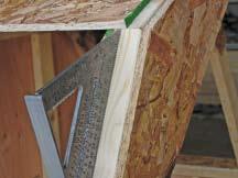 At this point, attach only the bottom edge of OSB panel to each truss.