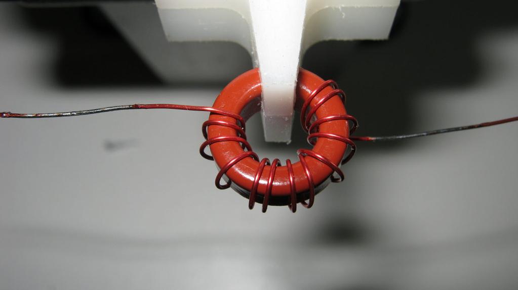 Wind the toroids, 'dry fit' them and prepare the magnet wire for soldering same as with the previous transformer.