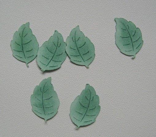 STEP 19 Use die-cut leaves (or cut your own) to