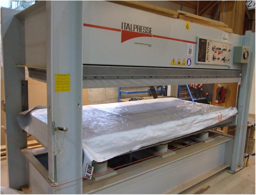 Veneer Pressing Veneers are pressed onto panel substrate under moderate