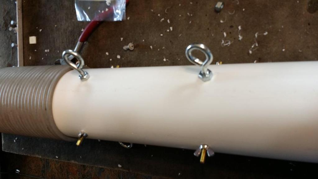 Step 7: Install Dipole Stress Relief Eyelets 90 degrees from each brass dipole electrical connection, install two eyelets directly opposite from each