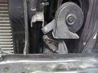 19. Using the 3/8 12 point socket, remove the four (4) bolts holding the bumper.