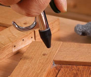 For broad, flat surfaces, you can also wrap the 0000 steel wool around a corkfaced sanding block.