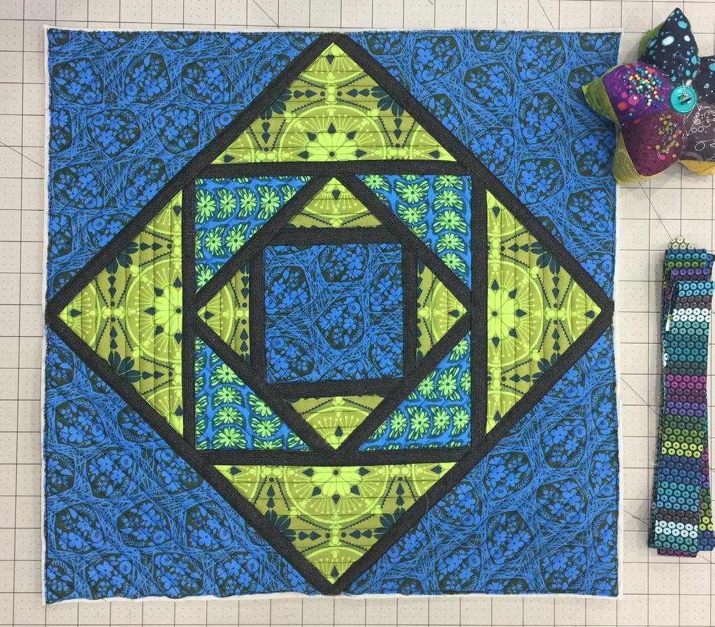 Stained Glass Block Mini Quilt 7. Trim the sides of the wall hanging when quilting is complete to square up. Binding: 1.