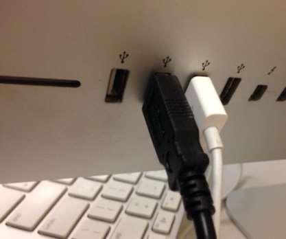 4. Plug the scanner in to the computer via a USB port on the back of the