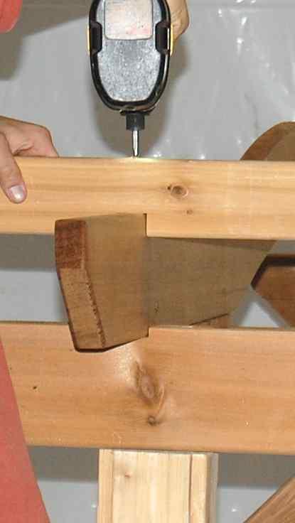 4. Attach the Long Stringer using one 3 1/2" Screw (DD) through each pre-drilled hole located above each