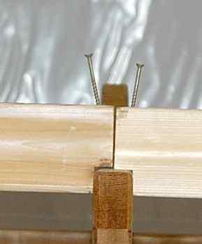 Starting at the outside, align the notches in the stringer to the notches in the rafters.