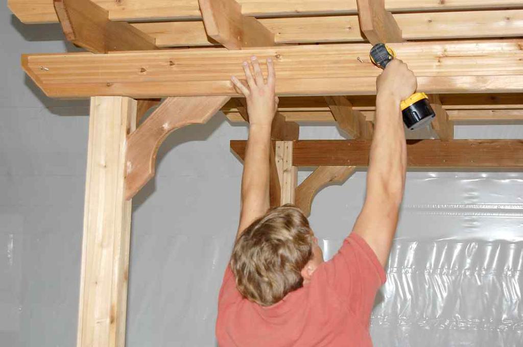 3. Locate one Short Beam Trim (S). Place Short Beam Trim snug against end of Long Beam Trim and snug against rafters. Attach using two 2 1/2" Screws (CC) at each end of trim.