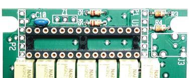 Inspect the 28-pin, low-profile socket for U1. Note that: Each pin has a shoulder. When installed, all of the shoulders must be in contact with the PC board.