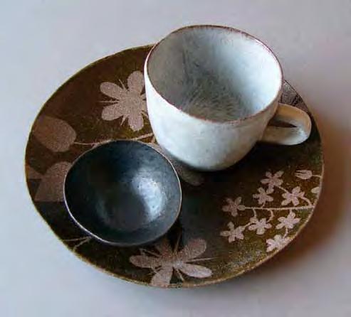 Kaori Tatebayashi, hump-moulded stoneware kurocha plate, kuro mini bowl, kohiki cup, 2008. Photo: courtesy of the artist.