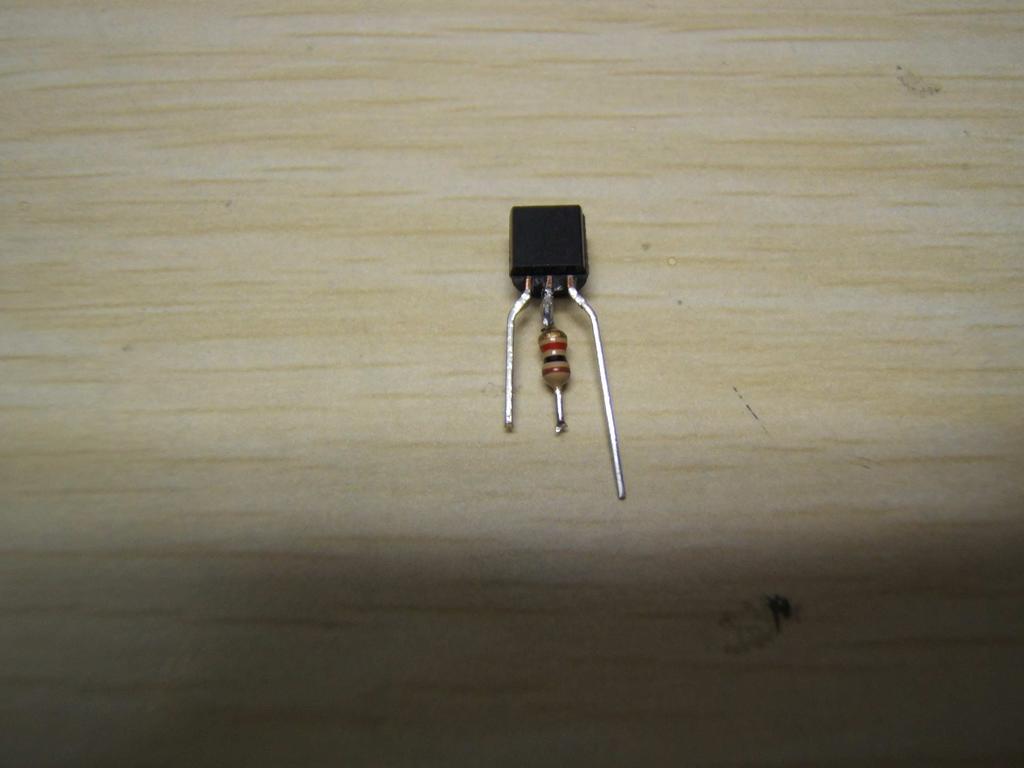 The transistor has a base collector and emitter as shown in the first image, note the flat side is facing up.