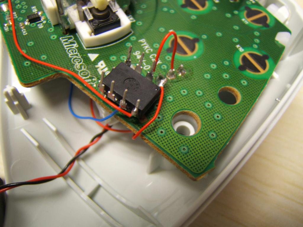 Finally flip the PCB over onto the back of the case and attach the remaining wire from the