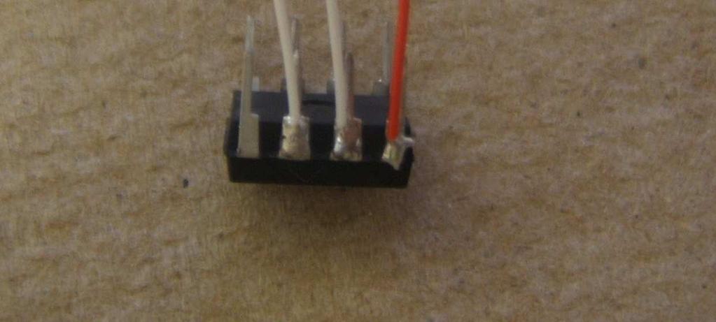 You can also see in this images the wires for the left and right buttons (white) attached to pins 2 and 3.