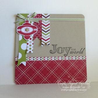 Step 8 Christmas Insert: 8a Begin with a 5-1/2 x 5-1/2 piece of Crumb Cake card stock. Round all four corners. Cut a 5-1/2 x 2 piece of the red plaid paper from the Season of Style DSP.