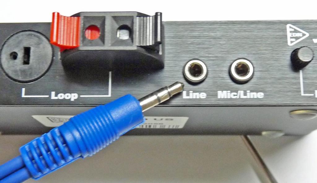 Plug the mini-phone plug on the other end of the audio cable