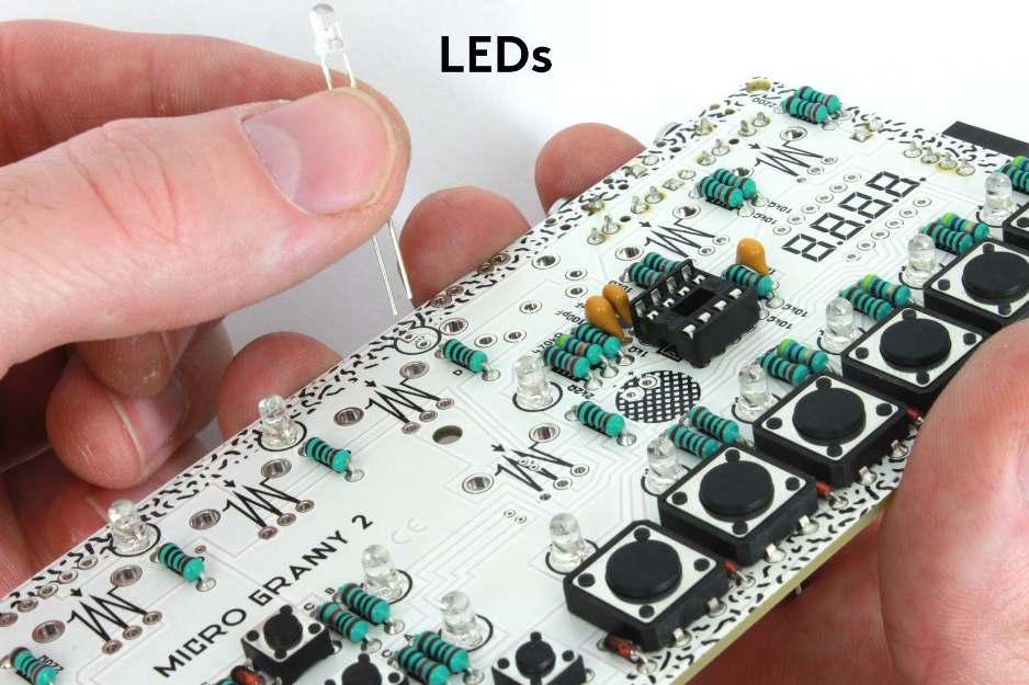 Insert the small transparent LEDs (12x) according to their