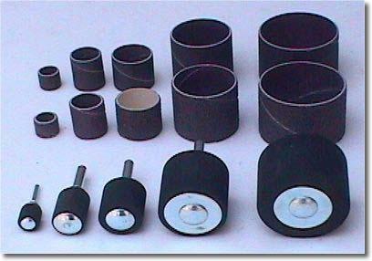 SANDING DRUMS Sanding drums are self expanding rubber spindles with hardened metal arbors and nuts.
