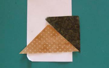 PLACING FABRIC Choose or cut a piece of fabric that will generously cover piecing area 2. Lay the block fabric-side up on your work surface.