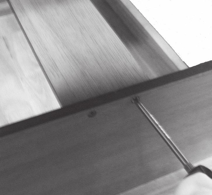 Screws. 11. Set the Lower Support (15) across the top of the Sliding Partition and against the sides of the Legs.