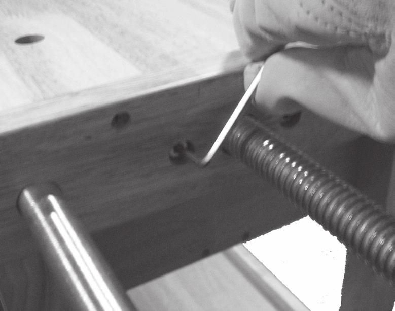 Once the Vise is threaded into the holes halfway, use the Hex Wrench to tighten the screws on either side of the Vise s center thread. See Figure N, right. 16.