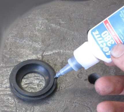 3: Make sure the bore of the ball joint cup has been lined with axle grease; it will help when