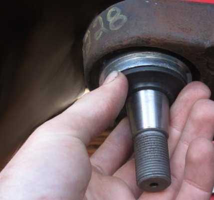 5.7: Place the seal on the ball joint cup and hold it in place for several minutes to allow the glue to set (Fig 30). 5.